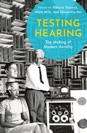 Book cover showing a vintage photo of scientist performing a hearing test on subjects