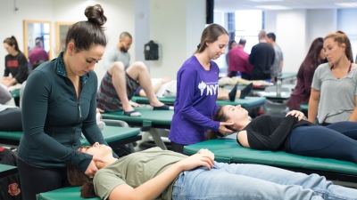 Physical therapy students attend a class lecture