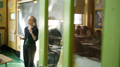 Student teacher teaching high school students