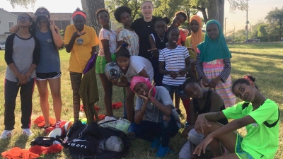 Ellie Bartlett with students