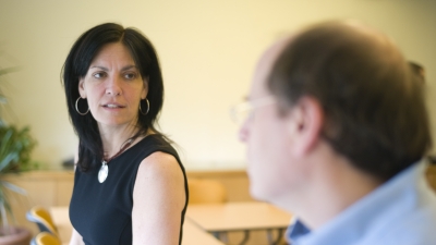 faculty members talking to each other