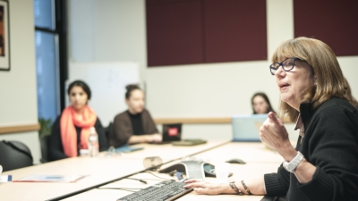Faculty and students in classroom setting