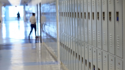 A row of lockers in a high school hallway