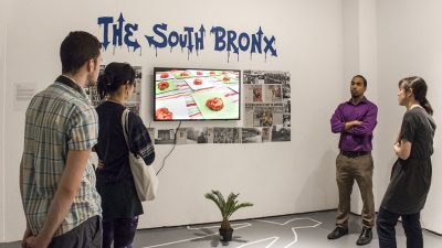 Students with work in gallery. 
