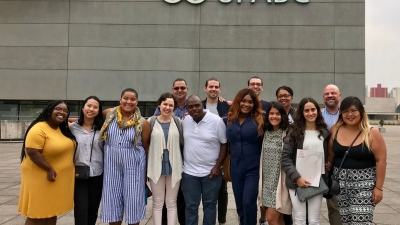 Group stands infront of UFABC with professor Erich Dietrich