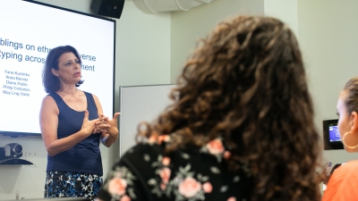 Faculty teaching in front of classroom