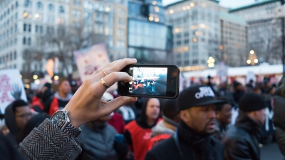 Cellphone taking a video at a Black Lives Matter protest