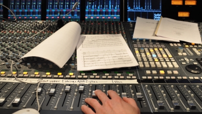 sound mixing board with sheet music