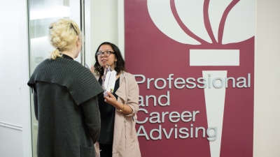 Advisor working with a student
