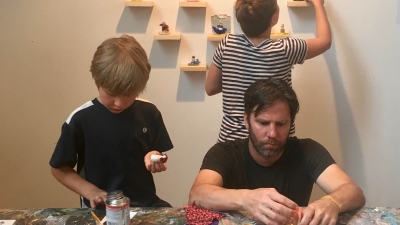 Kids with adult making art