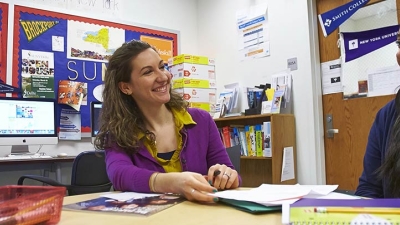 A counselor working one-on-one with her student