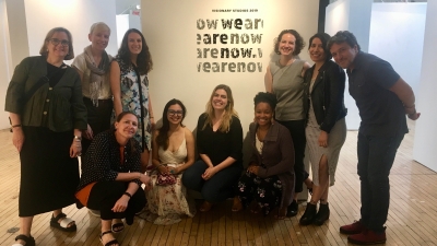 Students in front of exhibition.