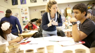 teacher listening to student
