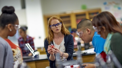 teacher leading a science experience