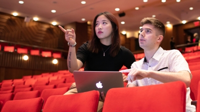 Students working in a theatre