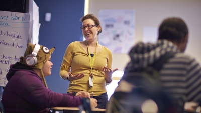 students and teachers laughing