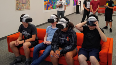 High School Students Wearing VR Goggles