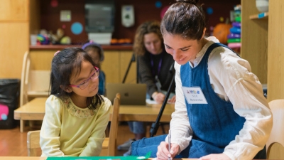 A picture of researchers studying with children