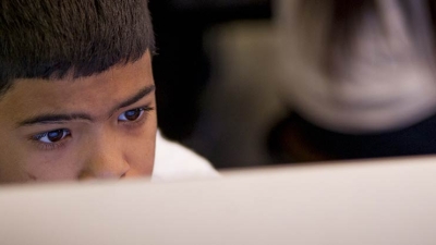 Student looking at computer