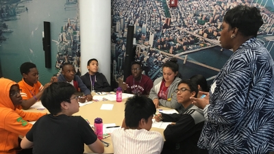 High school students sitting at a table