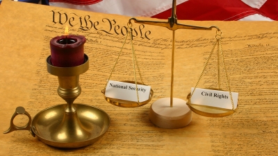 The Constitution with scales and a candle