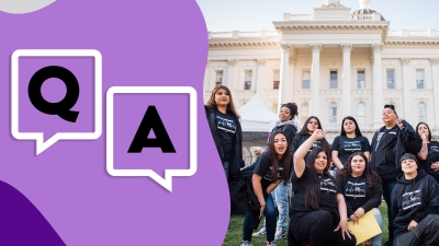 A photo of a collection of young adults in matching t-shirts that say "Young Women's Freedom Center" with the text "Q&A" superimposed on top