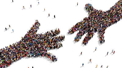 illustration of two hands trying to touch made up of people