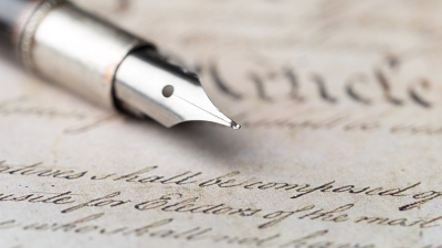 pen resting on the constitution