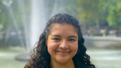 Headshot of Karina in front of Fountain