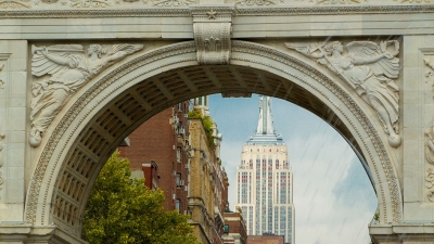The Washington Square Arch with the empire state building visible between the arch