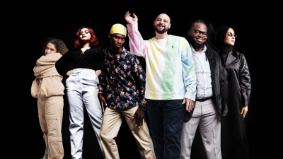 Six dancers representing hip hop posing for camera