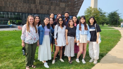 Steinhardt students in front of a museum in Washington DC on a sunn day