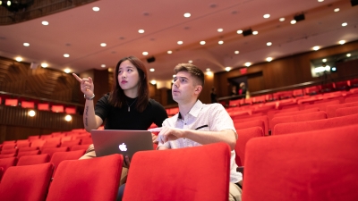 Two students working together in theatre