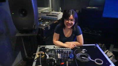 Student at an electronic board in Music Technology sound lab
