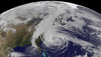 A view of the Earth form space. A large hurrican is visible on the east coast of the US.