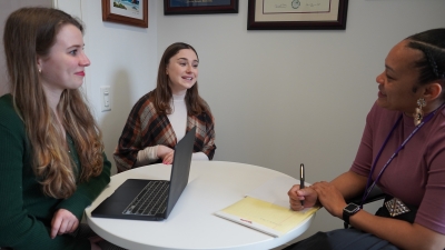 CSD students talking with an advisor