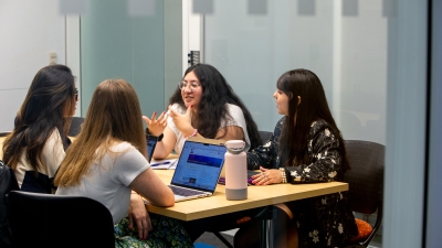 group of 4 ed studies students having a conversation