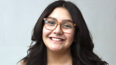Headshot with Natalia smiling 