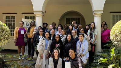 A group of students poses for a photo while on a visit to a South African university