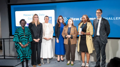 NYU PREP team and partners gatheron stage to accept New Commons Challenge Award. 