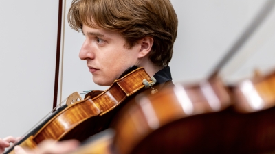 Up close shot of violinist practicing