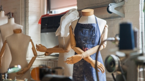 Fitting mannequin in classroom. 