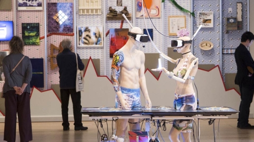Museum visitors looking at modern art