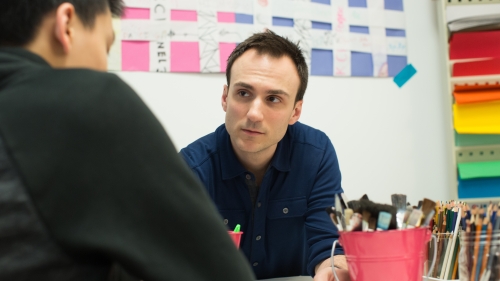 Art therapist working with a teen