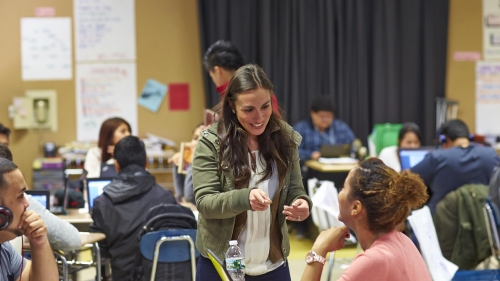 teacher mentoring high school student
