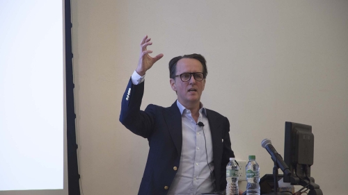 Tobias Meyer talking in lecture. 