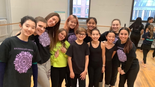 group of school children and master's students 