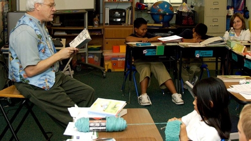 Teacher narrating a lesson in class