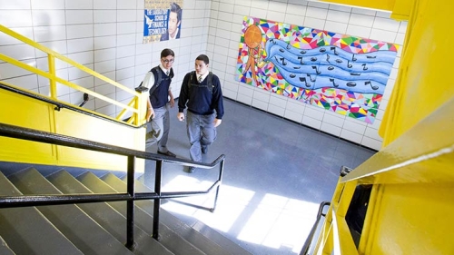 Students in Hallway Stairs