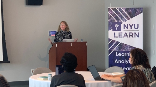 Rebecca Ferguson presenting on ethical challenges in the UK to audience 